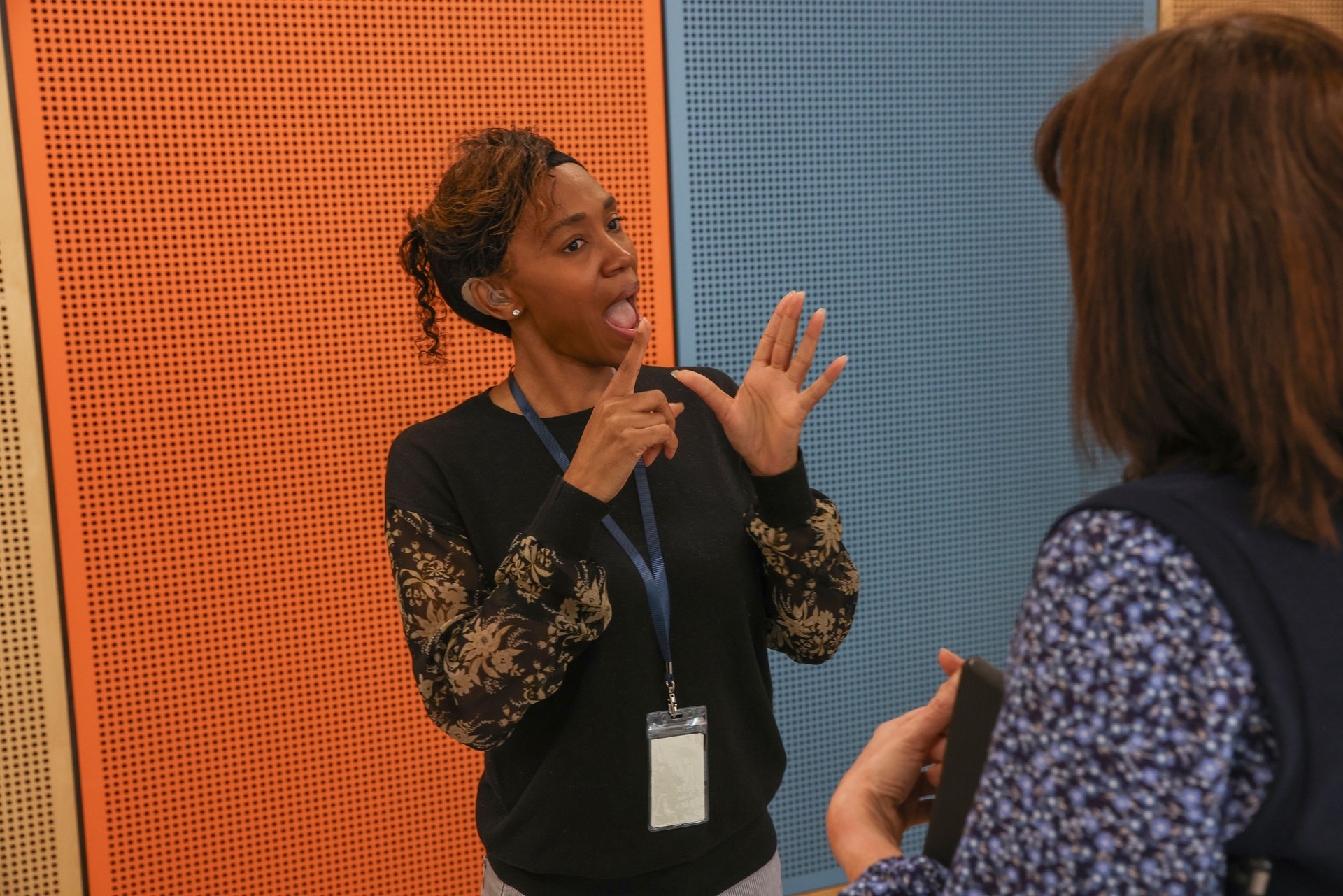 CoworkersÊusing sign language in office