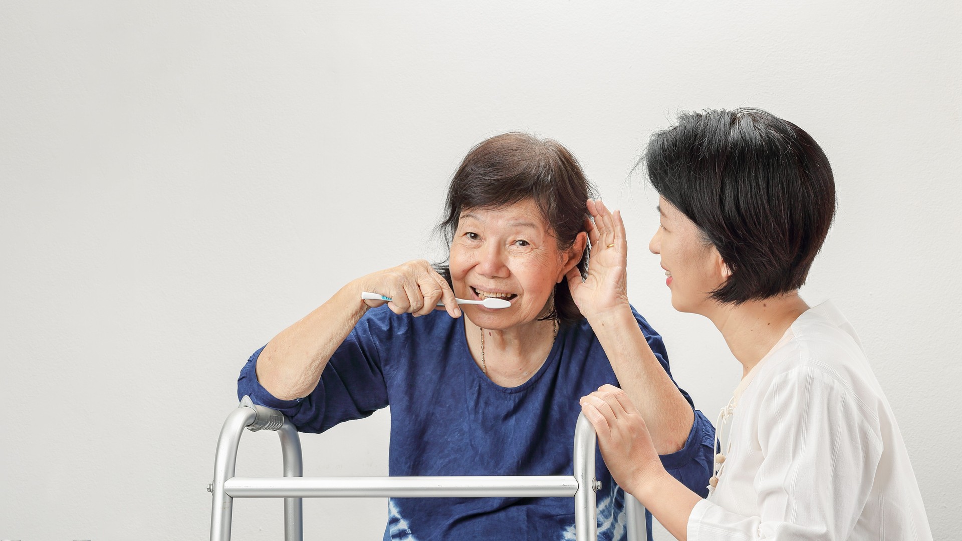 Asian seniors woman hearing loss , Hard of hearing